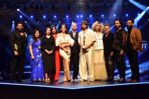 Sharvari felicitating the winner of Godrej Professional Spotlight along with jury & mentors of the initiative